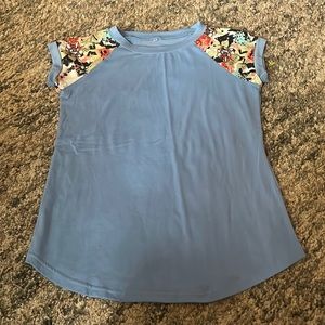 Amazon Blue Tee with Floral Sleeves